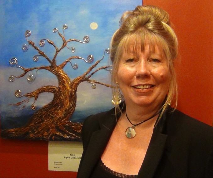 Alyce Underhill and one of her art exhibited works.