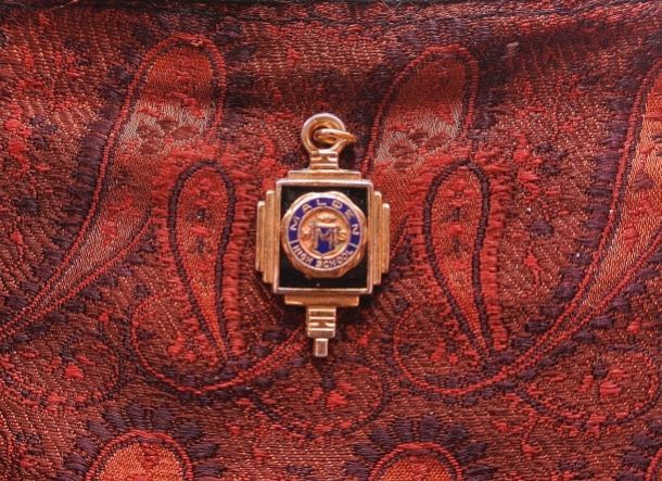 In the 1960's Ruderman's presented seniors at Malden High School with graduation gifts.  In 1964, the business gave graduating female seniors a small cedar hope chest, and a charm, pictured.  Charm donated for this article by Connie Doherty.