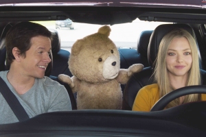 Film Still John (MARK WAHLBERG), Ted (SETH MACFARLANE) and Samantha (AMANDA SEYFRIED) hit the road in ?Ted 2?, Universal Pictures and Media Rights Capital?s follow-up to the highest-grossing original R-rated comedy of all time. MacFarlane returns as writer, director and voice star of the film.