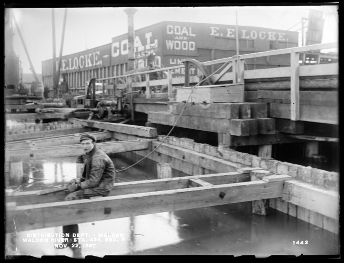 Distribution Department, Low Service Pipe Lines, Malden River crossing, Section 6, station 424, Medford Street, from the west showing where part of the bridge pier was removed, Malden, Mass., Nov. 22, 1897